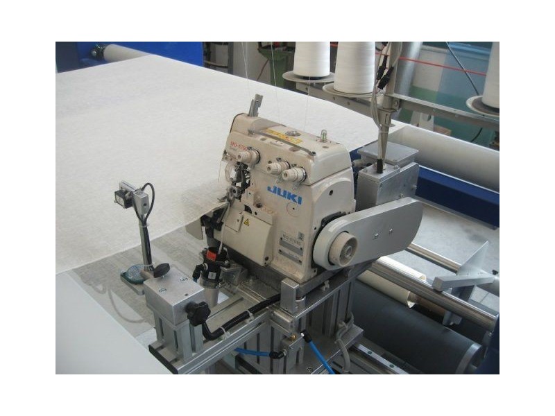 Macchina cucitrice automatica per sorfilatura - Preparazione inkjet T-2L Texma srl - 8