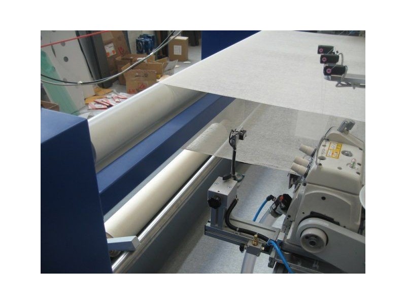 Macchina cucitrice automatica per sorfilatura - Preparazione inkjet T-2L Texma srl - 9